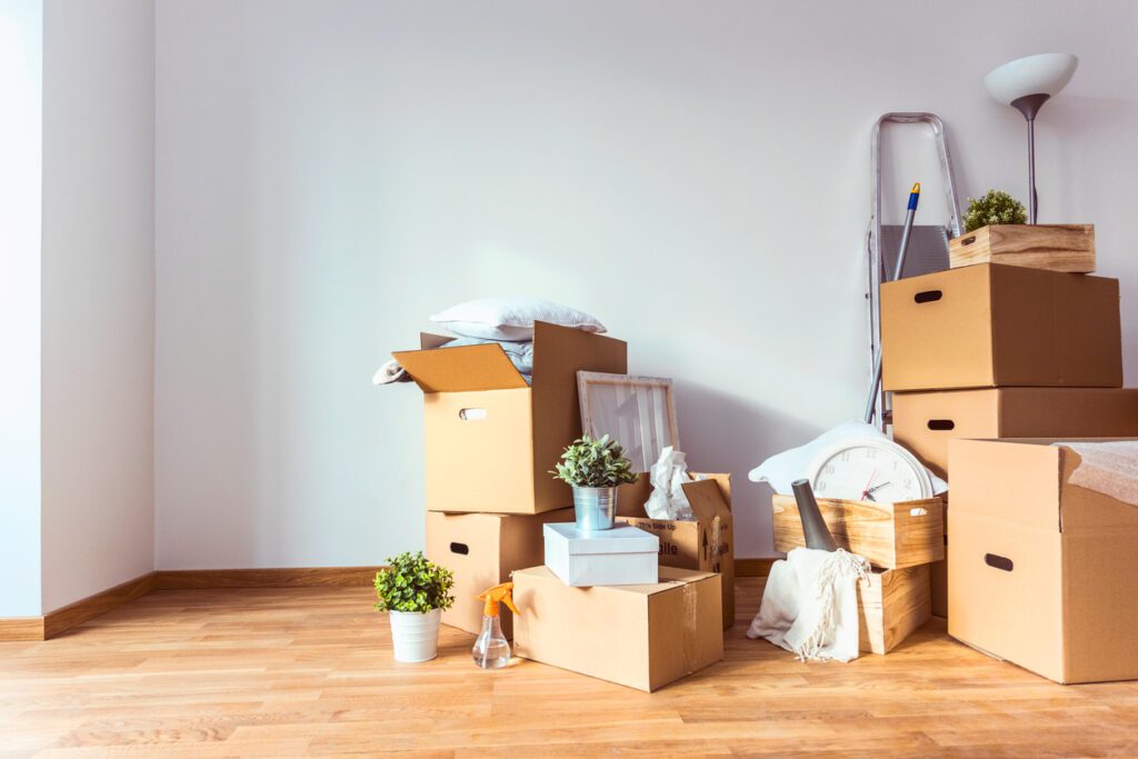 Empty room full of moving boxes